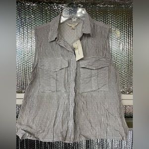 NWT short sleeveless shirt.